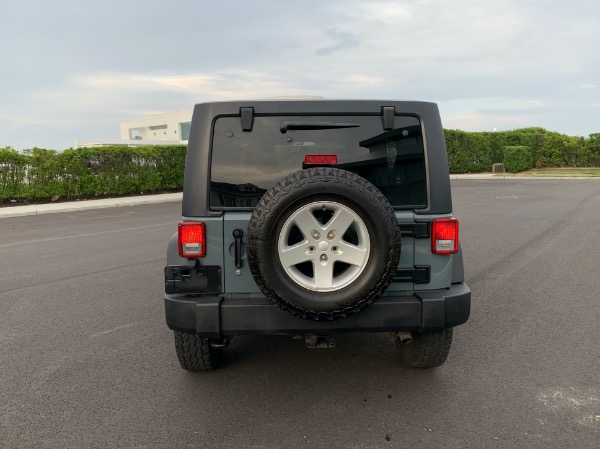 Used-2015-Jeep-Wrangler-Unlimited-Sport